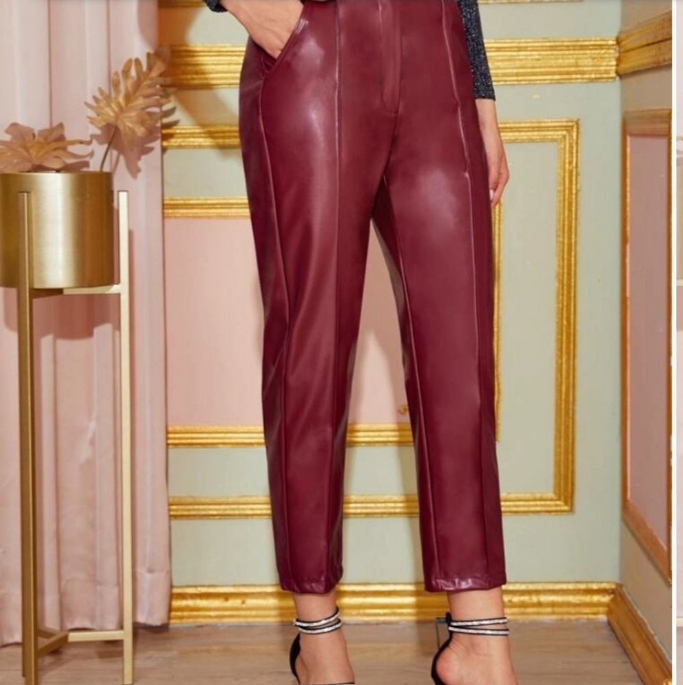 Button wide waistband leather look pants.